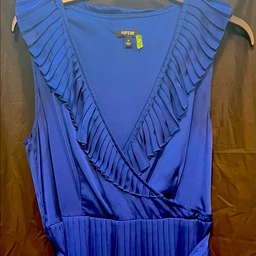 Knee-length, blue silk dress with pleated bottom